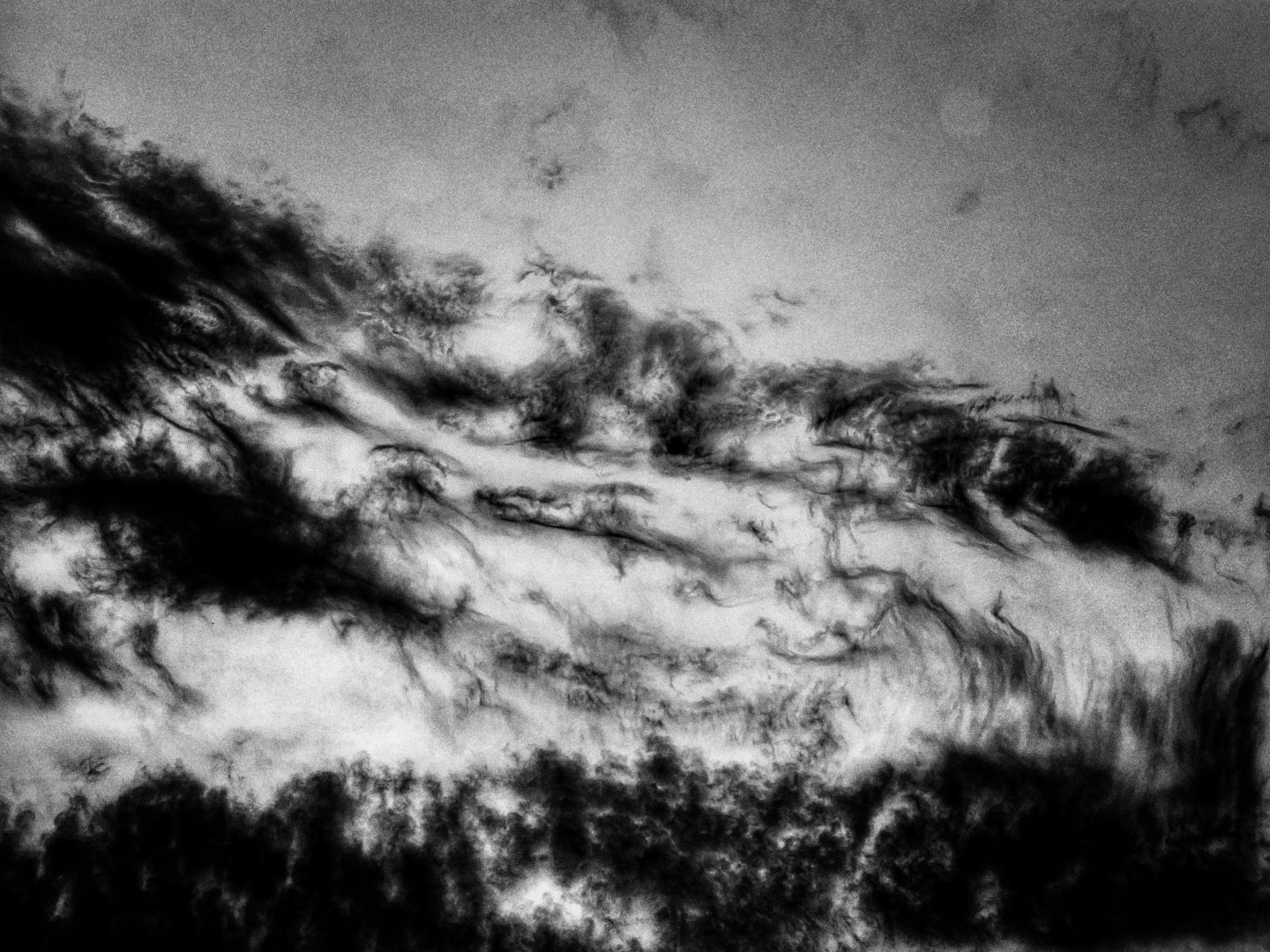 Clouds ripping apart.