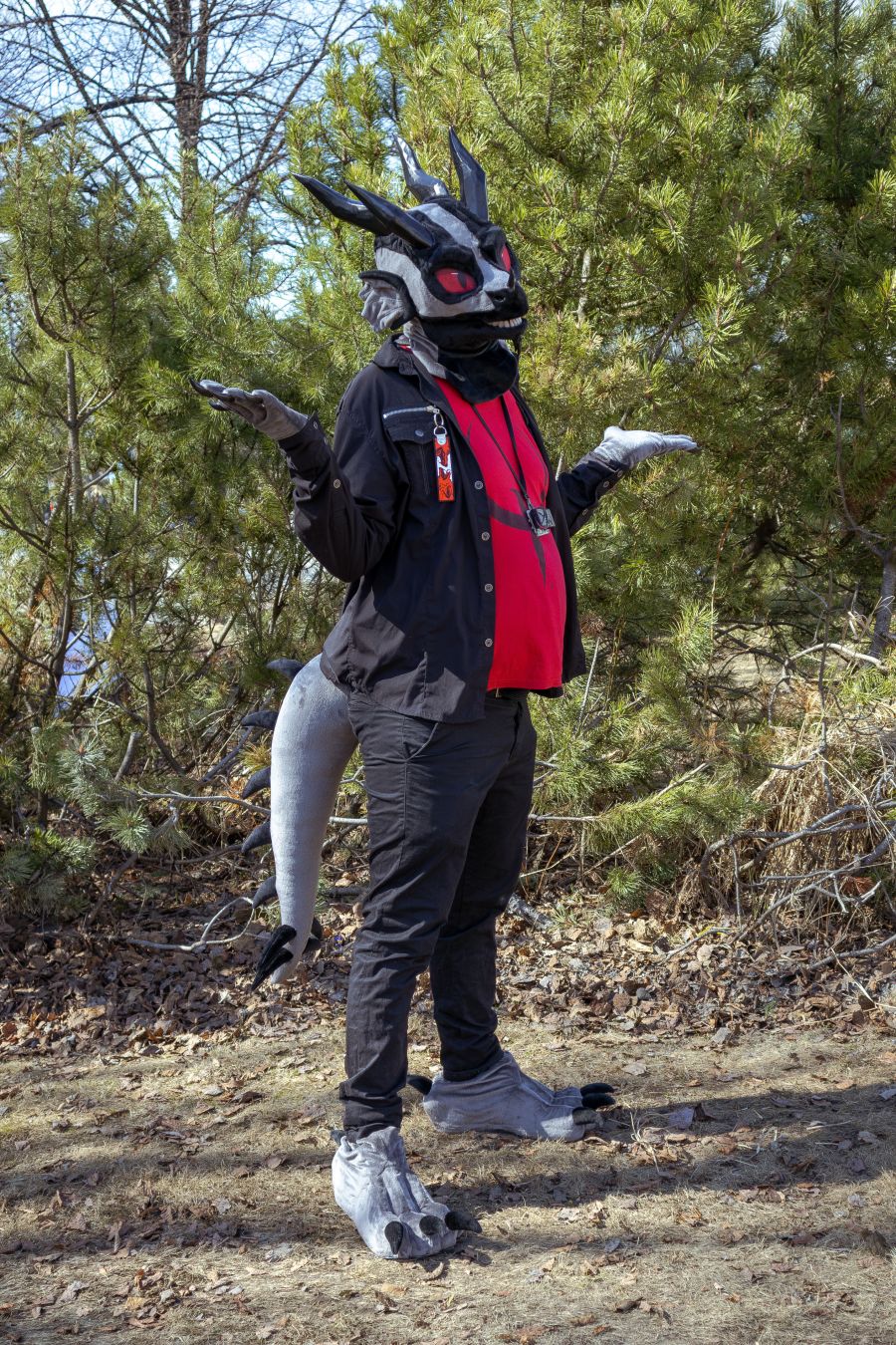 Lizardman cosplay doing a shrug